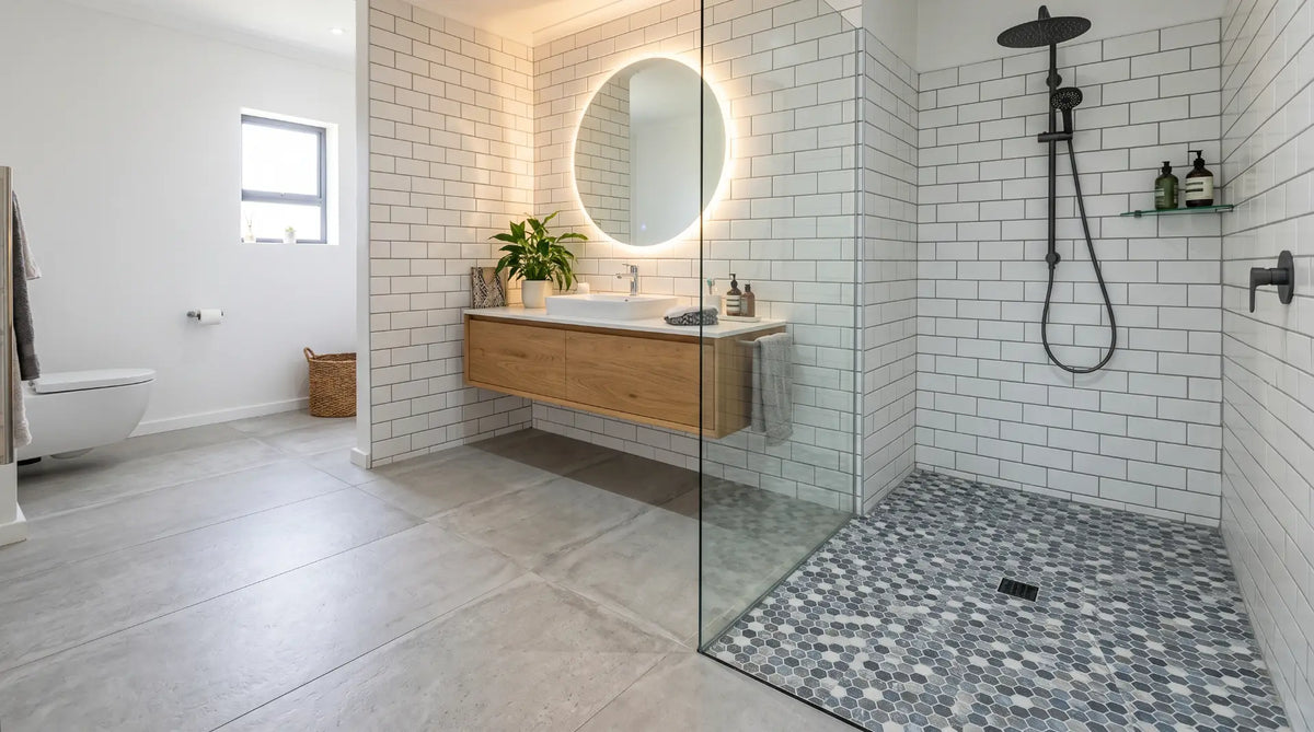 modern bathroom tile showcase with split sections showing floor tiles, wall tiles, and shower tiles, large format porcelain floor, subway wall tile, mosaic shower floo
